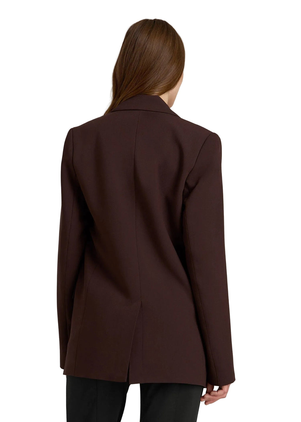 Brown coat worn by a person on a plain background